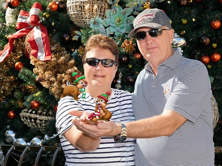 Guest Photo from Annie Virgo: Guests in front of giant Christmas tree at Walt Disney World