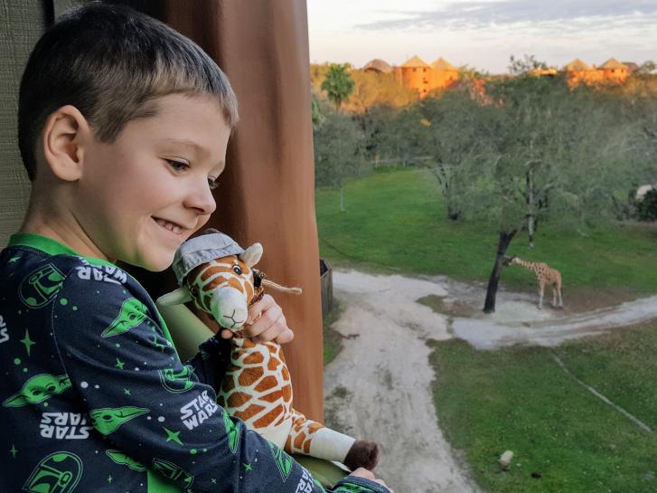Guest Photo from Jan Perry: Guest on balcony at Animal Kingdom Villas