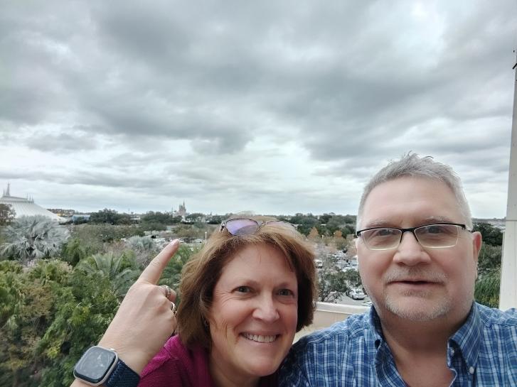 Guest Photo from Jonathan: Guests on balcony with view of Magic Kingdom at Bay Lake Tower