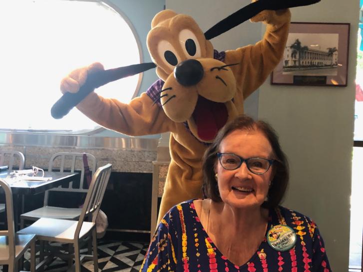 Guest Photo from Lorilee Alexandra Glenat: Guest dining with Pluto at Walt Disney World