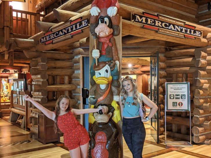 Guest Photo from Amanda Compo: Guests with the Totem Pole at Disney's Wilderness Lodge
